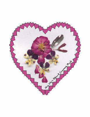 My Mum refers to  Johnny-Jump-Ups as �Kiss Me Johns�, but I think they can be used as a more general invitation! In any case, a trio of their expressive little faces surround a Carpet Rose, along with the tiny spotted feather from a Downy Woodpecker, which sits above the winged seed of a Red Maple tree.